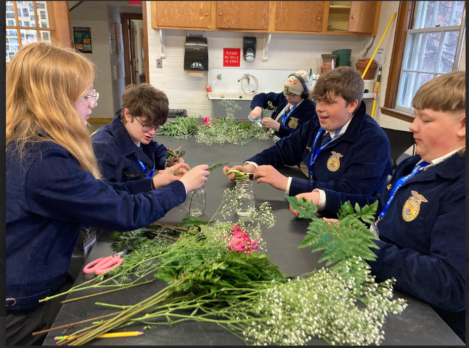 students make floral arrangements