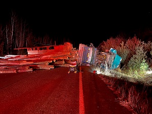 Logging truck rollover on Route 9 in Clifton
