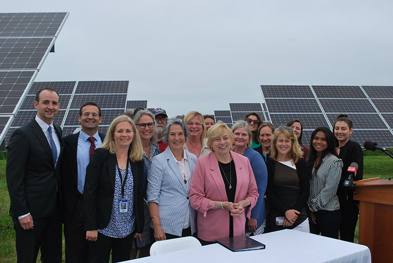 Mills and group at energy and climate change signing
