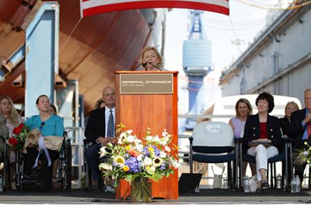 Governor Mills at the podium