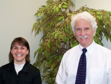 Division of Deafness staff Nancy Melanson and John Shattuck