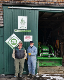 Consulting forester with landowner at his home