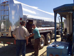 Ray adjusts a home fuel delivery truck meter