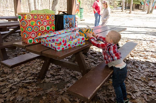 Child with birthday presents