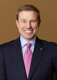 A smiling AG Aaron Frey