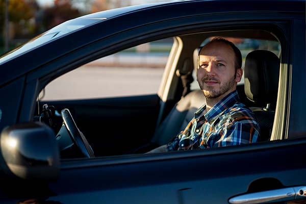 Man sitting in a car