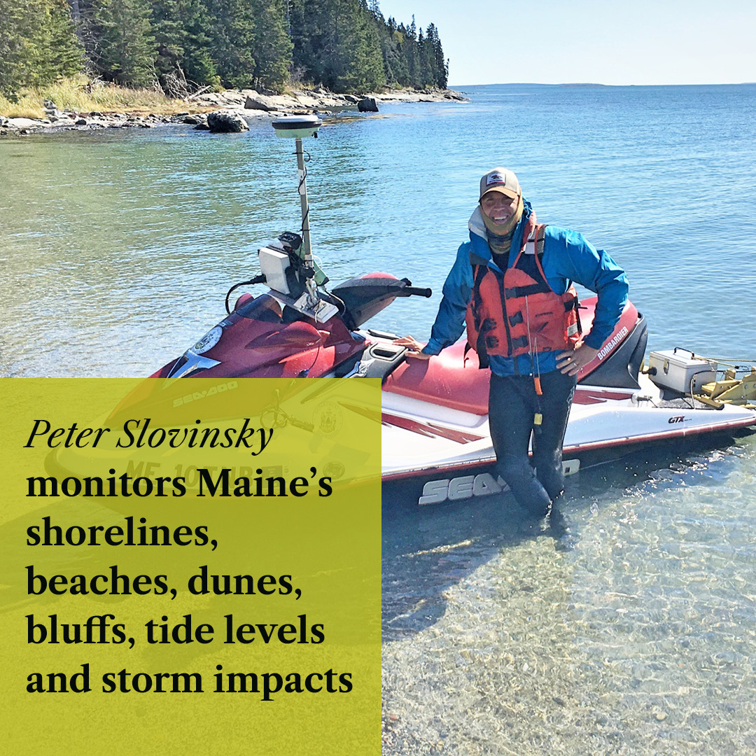Man standing in water next to a personal watercraft. Text in foreground reads "Peter Slovinsky monitors Maine's shorelines, beaches, dunes, bluffs, tide levels and storm impacts." 