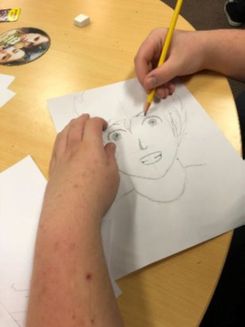 Anime drawing activity with residents led by a professional artist