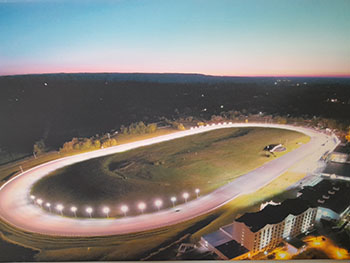 Aerial view of race track at night.
