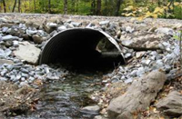 Arched culvert spanning streambed