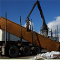 Skidder bridge being loaded on to log truck