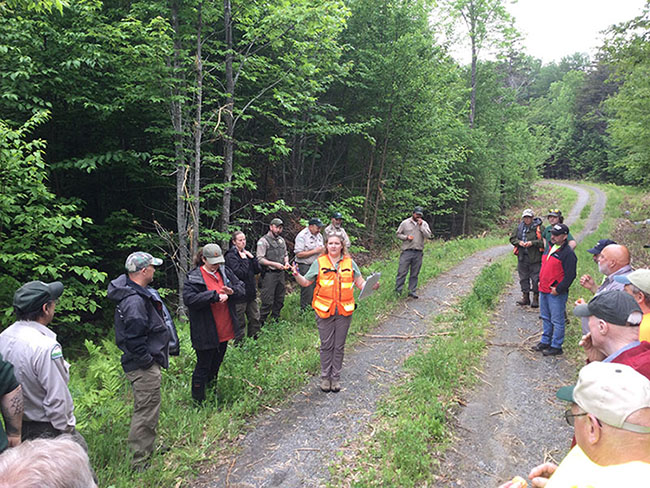 Maine Forest Service District Forester Lauren Ouellette speaks to a group of foresters and loggers at a MFS “Fundamental BMPs for Haul Roads and Skid Trails” training in Millinocket.