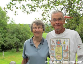 George Rogers and his wife standing on their property.