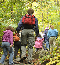 hiking with children on a rocky trail