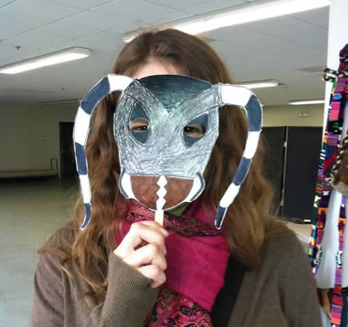 person with Asian longhorn beetle mask