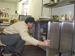 Gerry inspects food prep area