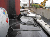 Overfill of a liquid asphalt tank