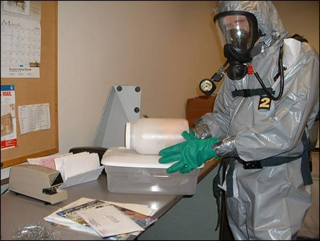 A DEP Responder investigating a white powder incident in Winthrop