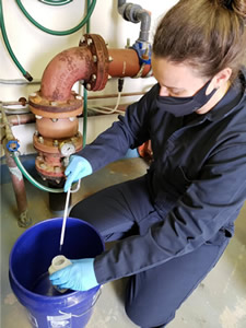 DEP Staff sampling water