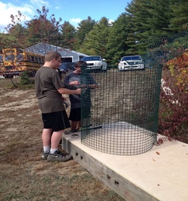 kids building compost bin