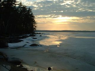 Sebago Lake sunset with melting ice