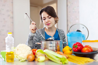 woman cooking healthy foods