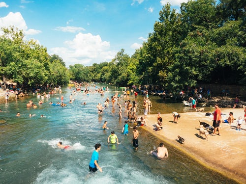 People swimming in a river