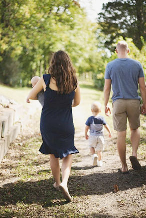 family walking on trail