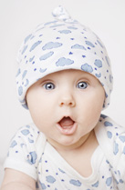 cute baby with bright eyes and open mouth