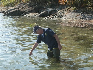 volunteer taking sample