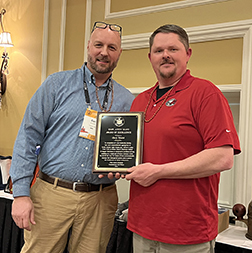 DMR Andy Mays Award recipient with Commissioner Wilson