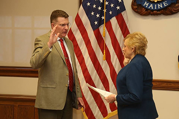 Photo of Commissioner Keliher being sworn in by Governor Janet Mills