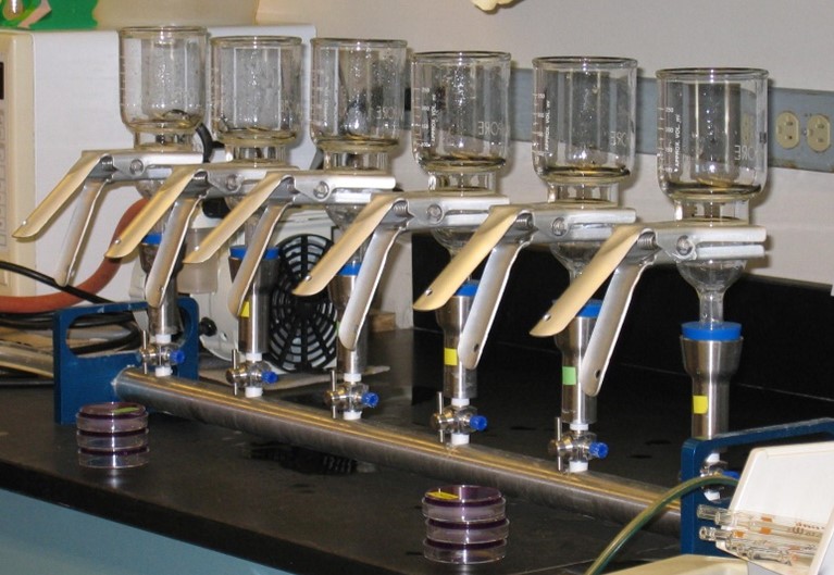 Figure 1. A photo of the water filtration setup that each lab analyst uses to filter and collect bacteria.