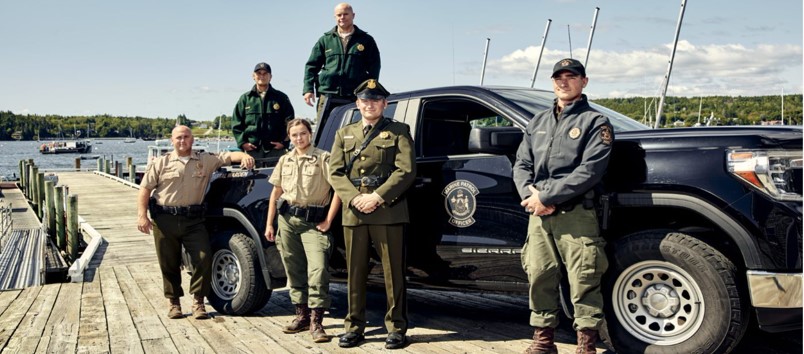 Officers by a truck