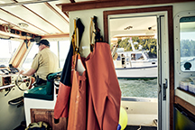 Marine Patrol Officer at the Helm