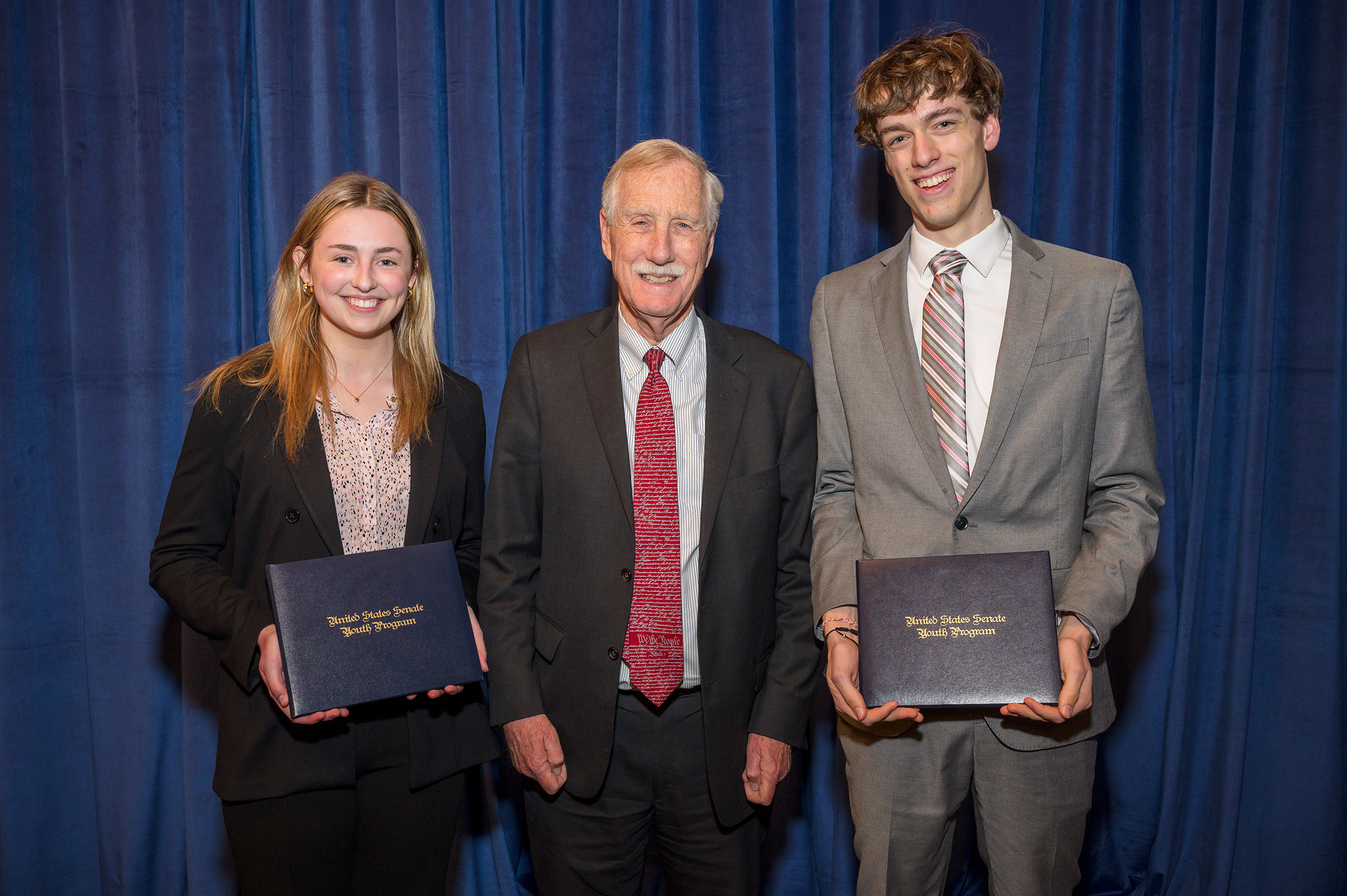 Senator Angus King with delegates Claire Ouellette and Ryan Hafener