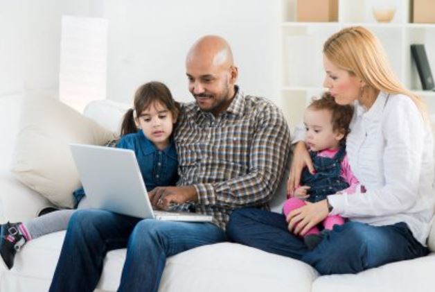 Family reading a newsletter together