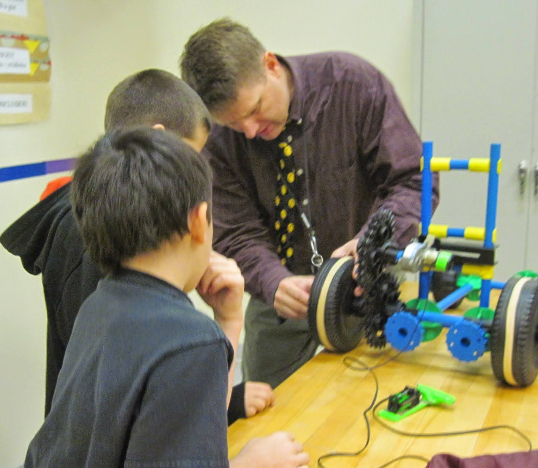 Mr. Kelley building car with students