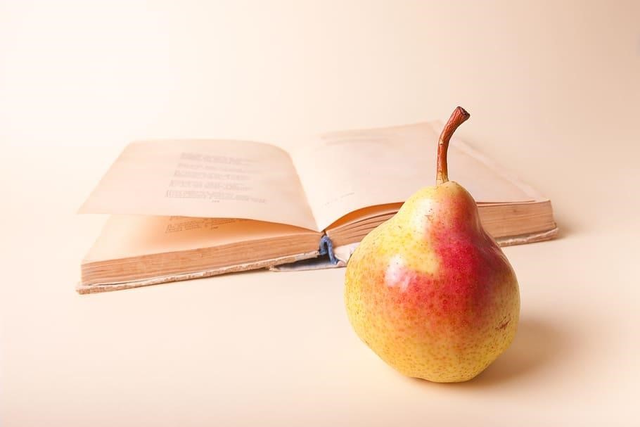 Pear with a book