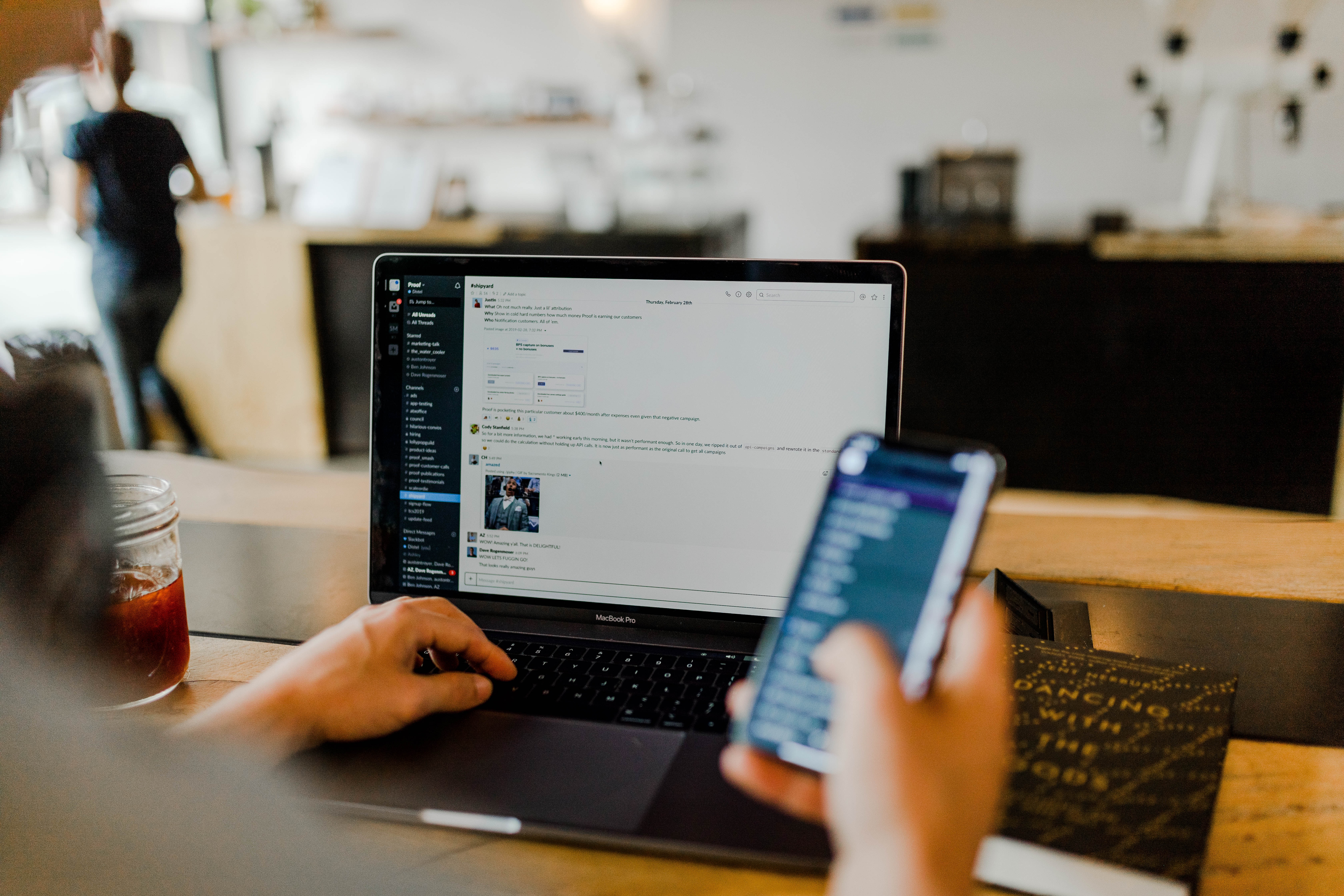 Laptop and phone in coffee shop