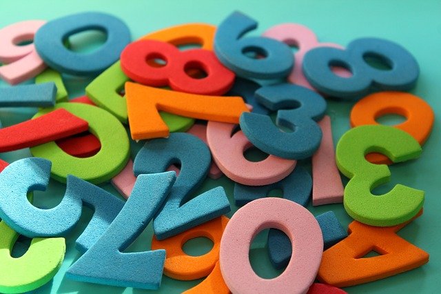 pile of colored wooden numbers