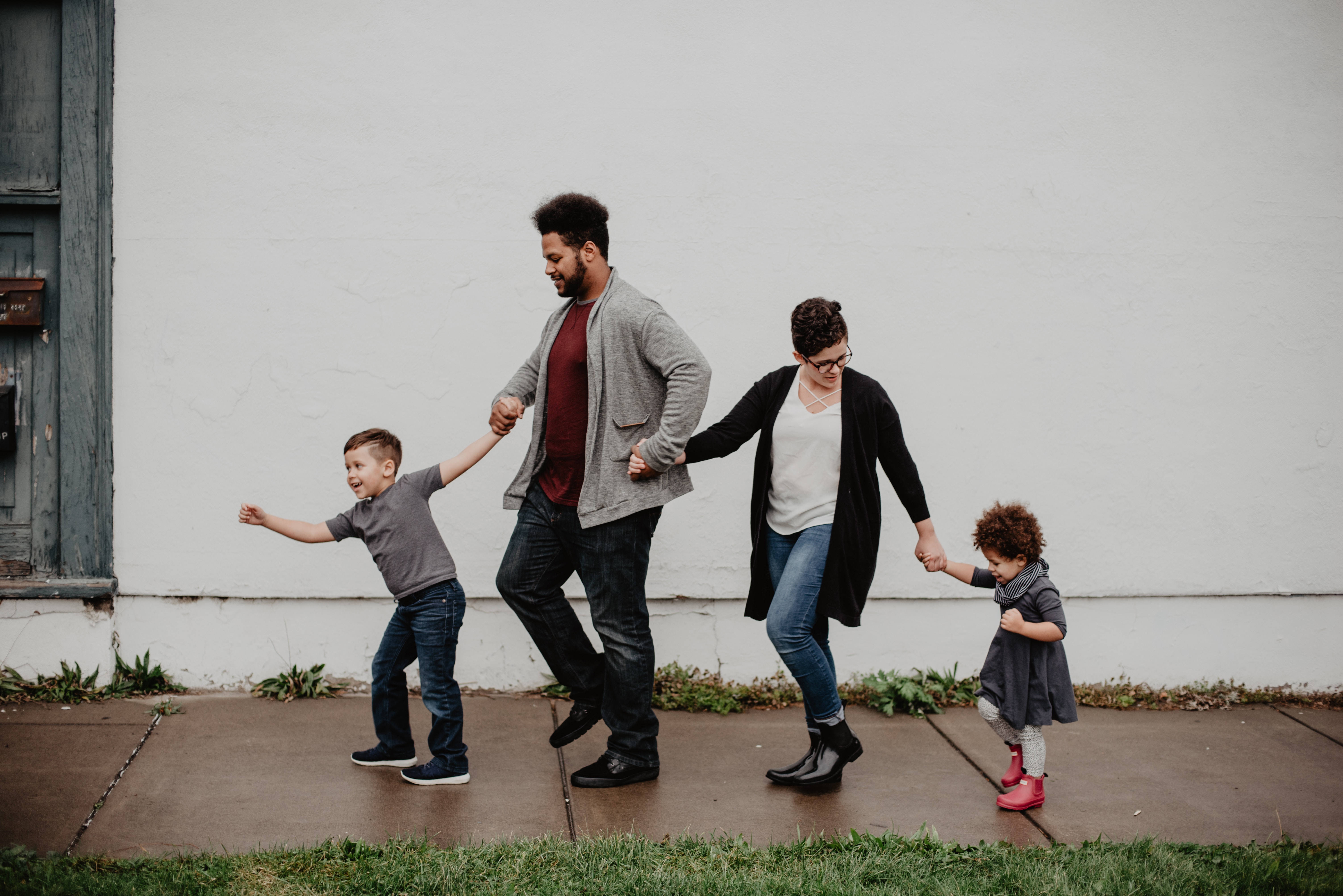 family walking hand-in-hand