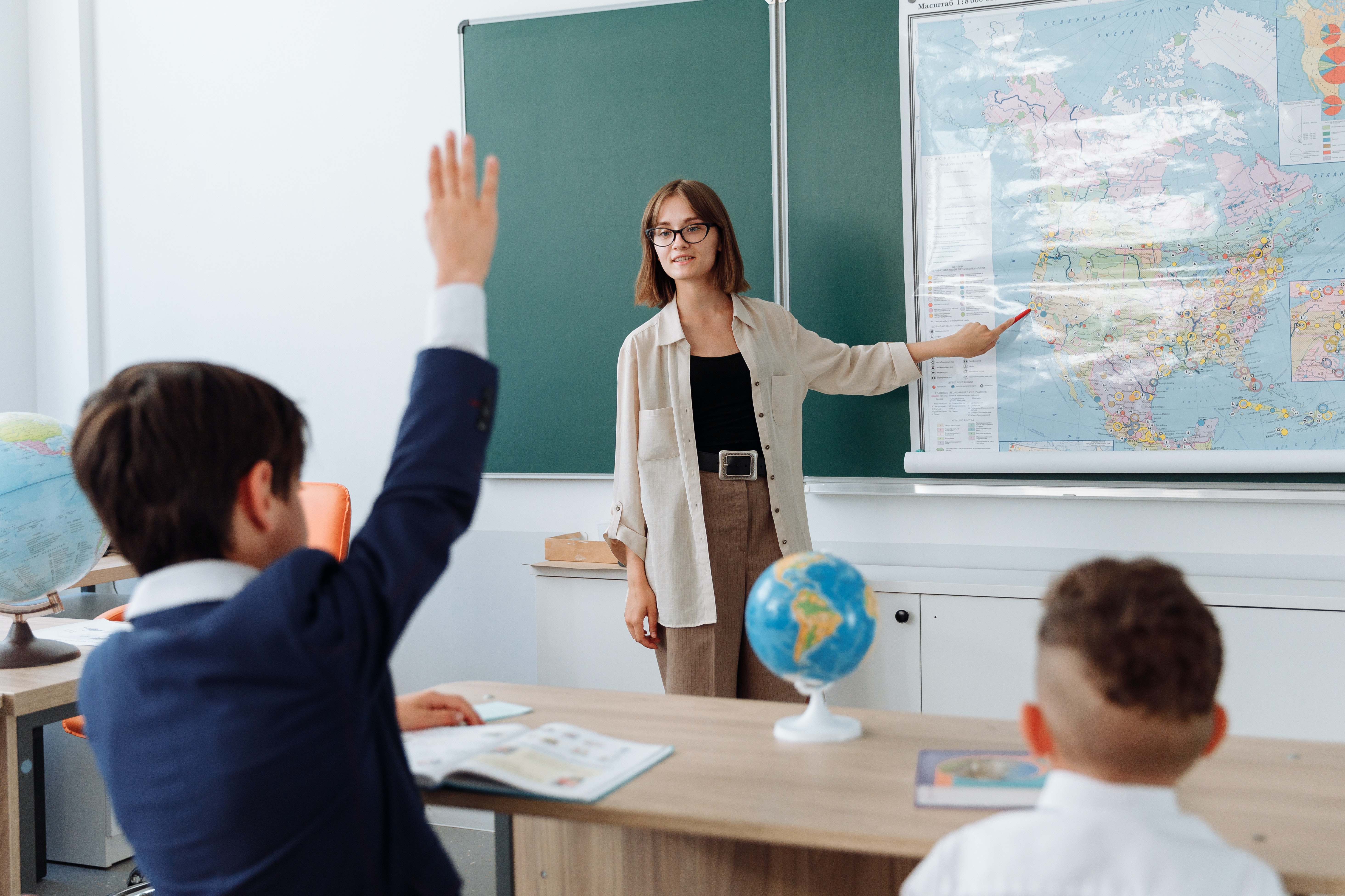 teacher with map
