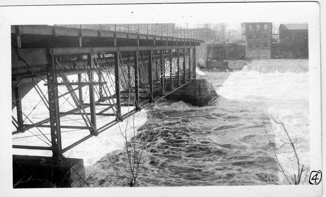Image of bridge after truss collapse during a flood