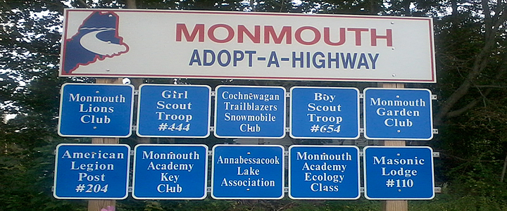 A sign of Adopt a highway