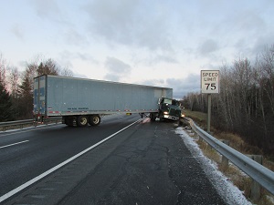 Island Falls Jackknifed truck