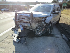 Marked Maine State Police cruiser damaged in front