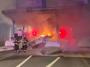 Toll Crash with smoke and fire extinguishing material.