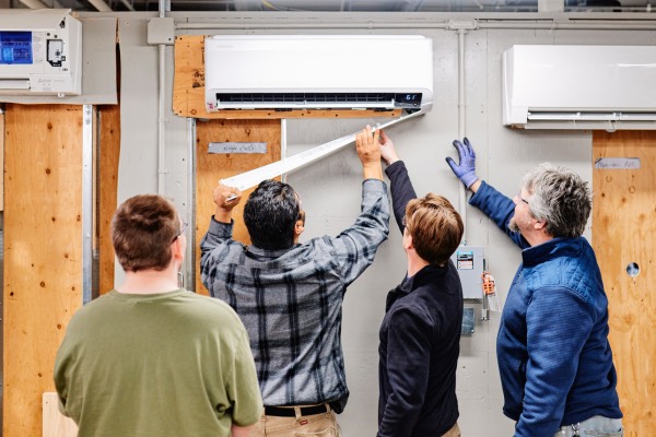 People inspecting insulation