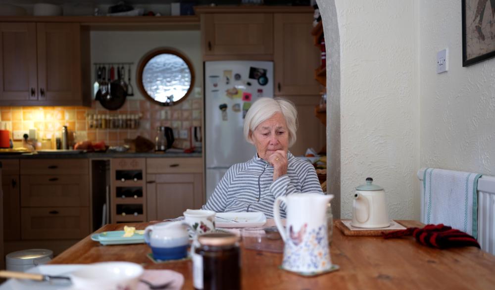 Elder Justice woman at a table